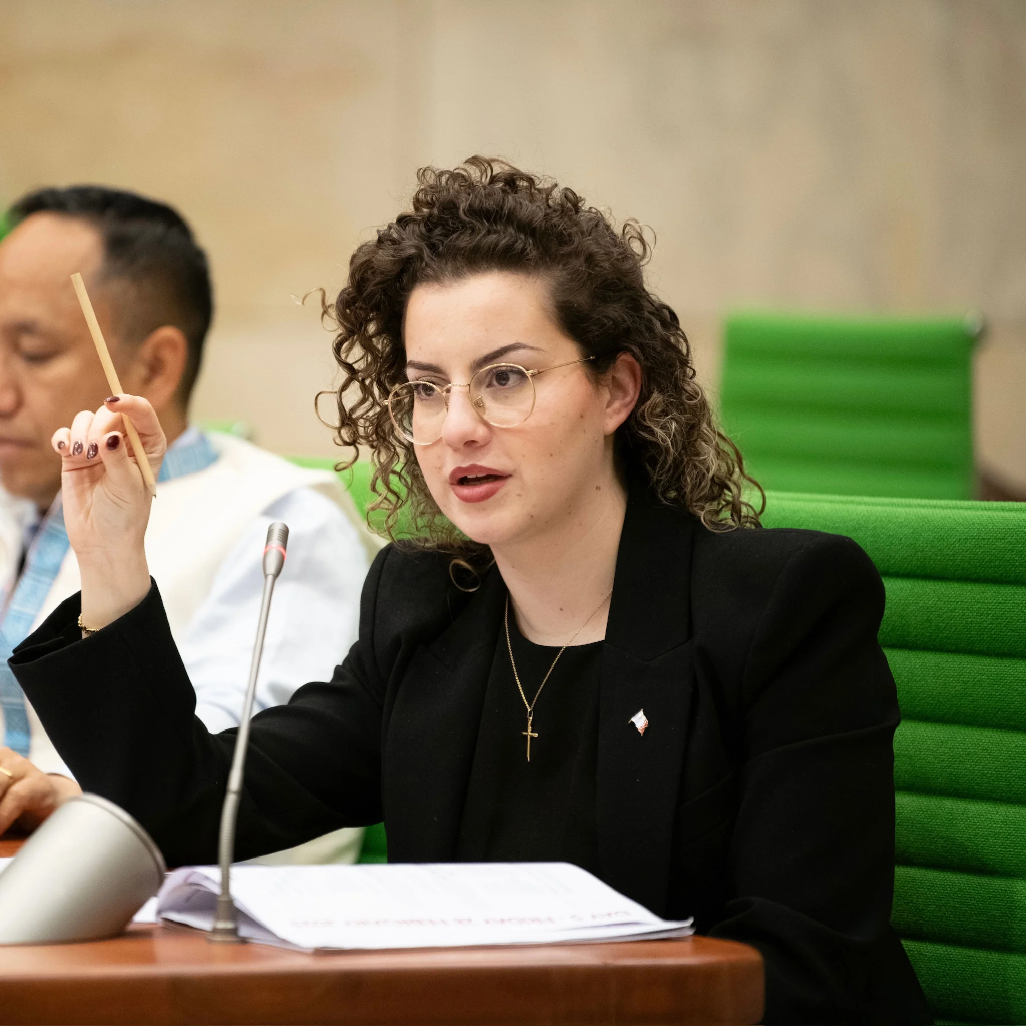 Eve Borg Bonello warmly embracing elderly constituent at public event