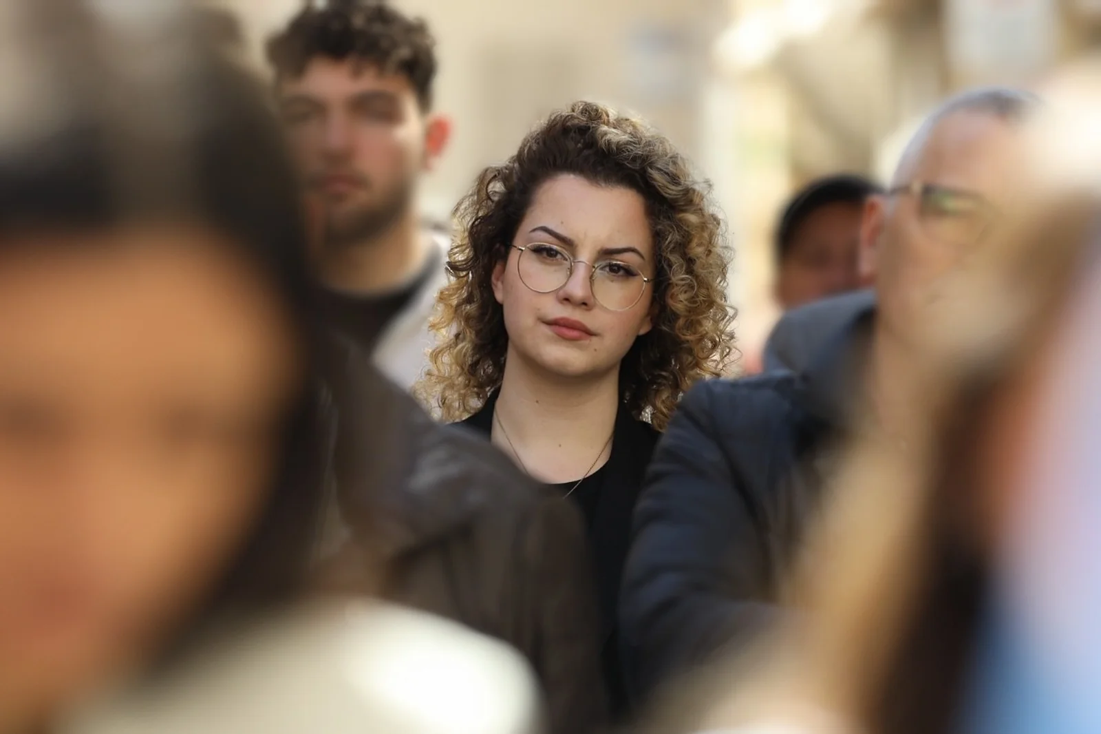 Eve Borg Bonello smiling with supporter at community event