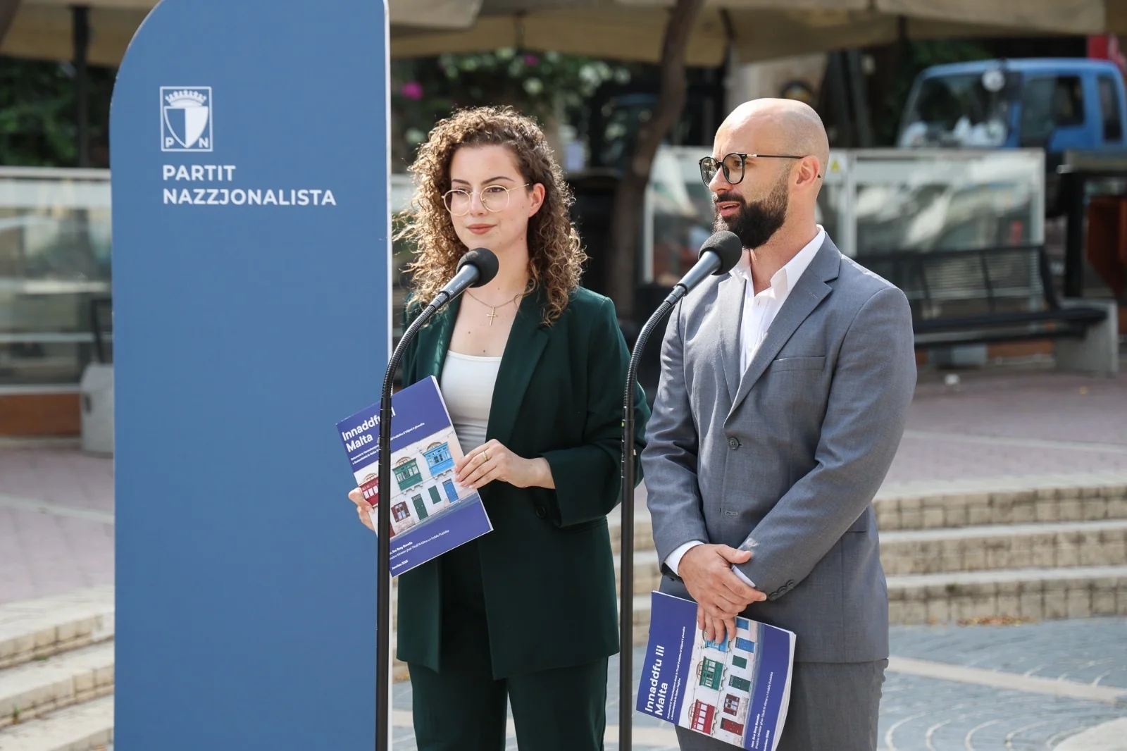 Eve Borg Bonello raising hand to speak during parliamentary session